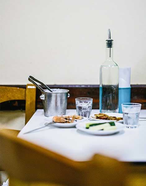 Tsipouro and mezze plates in Volos